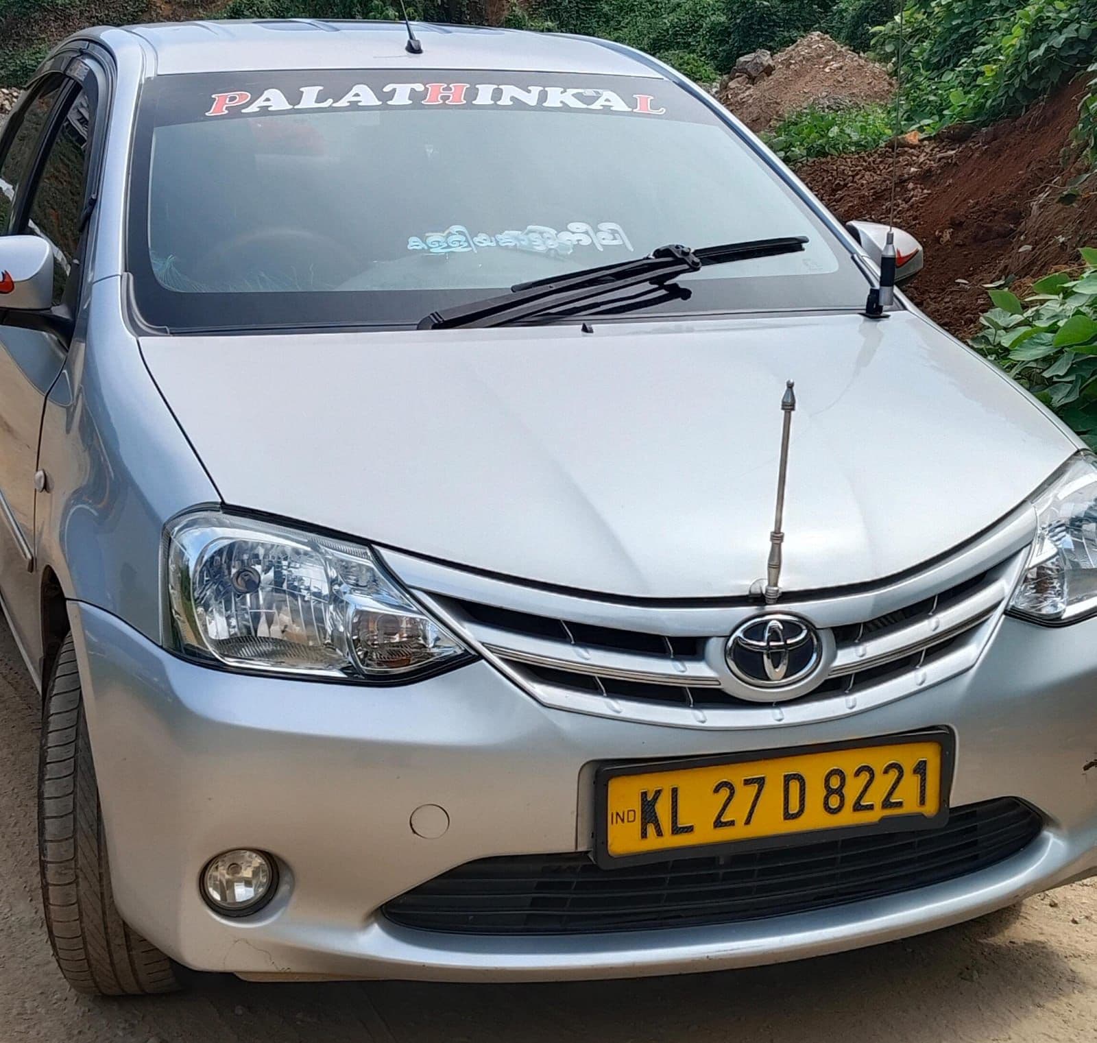 Toyota Etios — close-up of hood and windshield